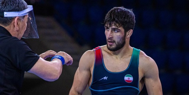 مسابقات جهانی کشتی فرنگی| پشتام مدالش را به چه کسی تقدیم کرد؟