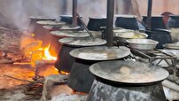پخت و توزیع ۱۰۰ دیگ نذری در شهر خور لارستان